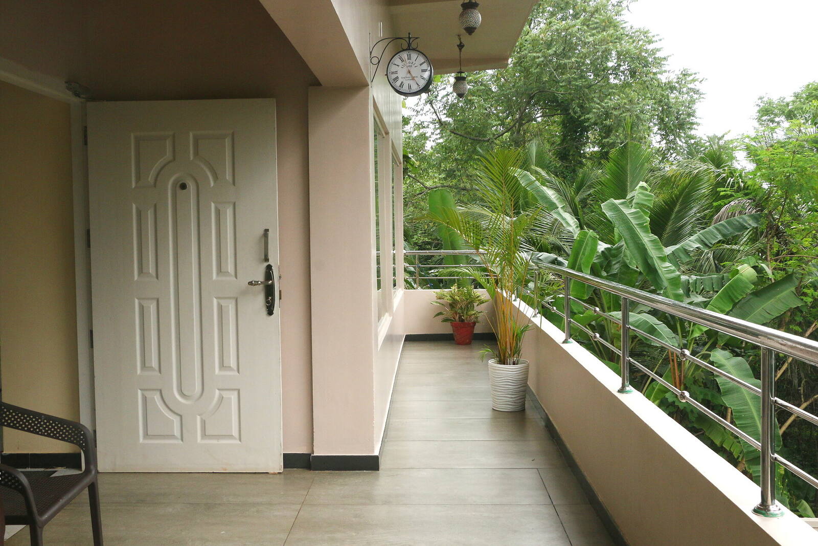 Private balcony overlooking the forest canopy at The Shore Wellness