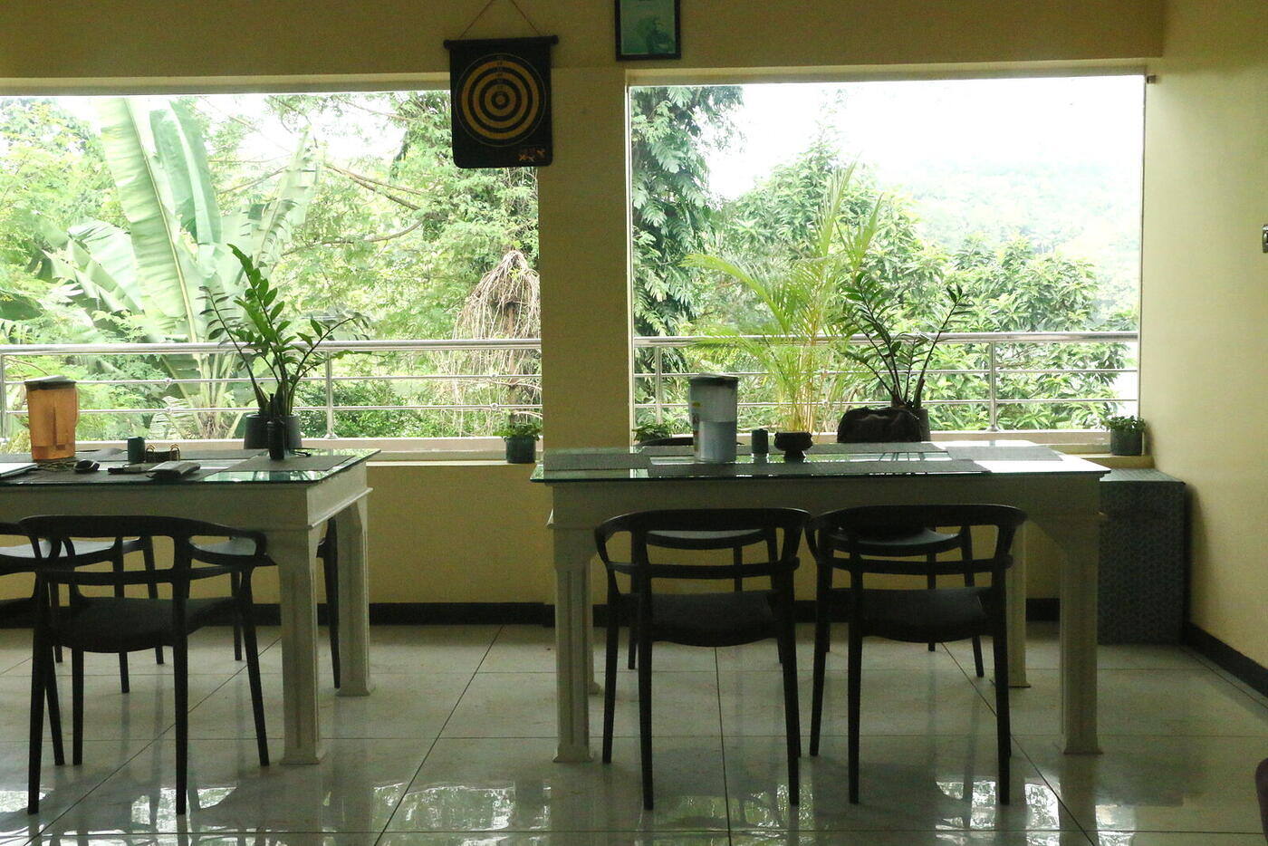 Balcony dining with forest views